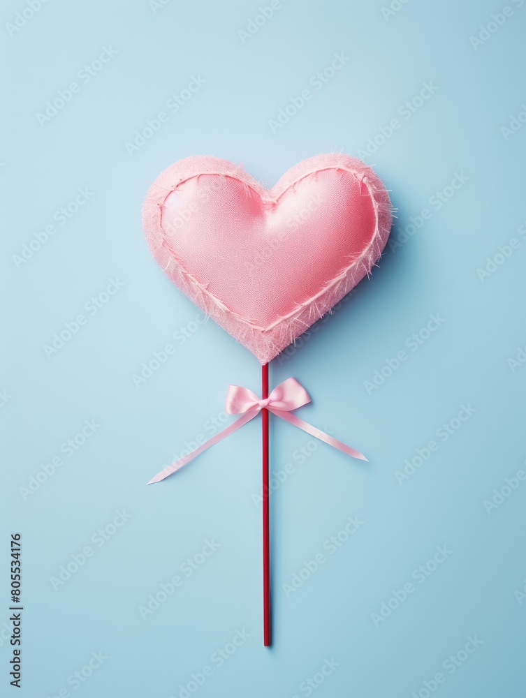 Wall mural pink heart-shaped cushion on blue background