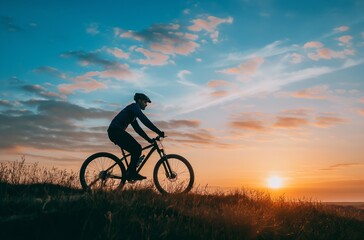 Cyclist silhouette against sunset