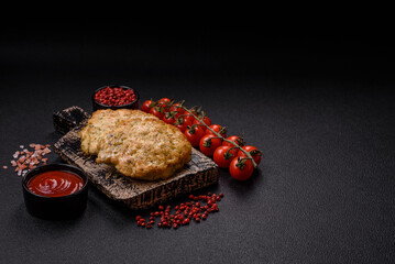 Delicious fried minced chicken cutlets with salt, spices and herbs