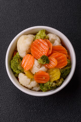 Delicious fresh vegetables broccoli, cauliflower, carrots steamed with salt