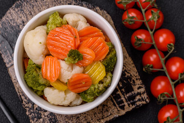 Delicious fresh vegetables broccoli, cauliflower, carrots steamed with salt