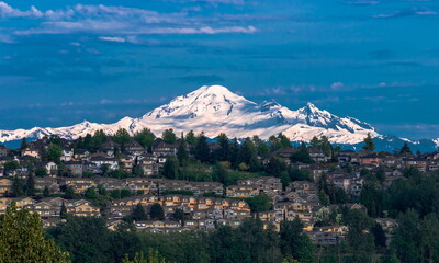View of the dormant Baker Volcano in Washington State. View from the city of Coquitlam to a village of townhouses, British Columbia, Canada