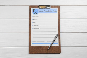 Medical prescription form with empty fields and pen on white wooden table, top view