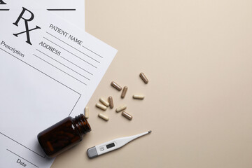 Medical prescription forms, pills and thermometer on beige background, flat lay. Space for text