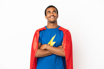 African American Super Hero man over isolated white background looking up while smiling