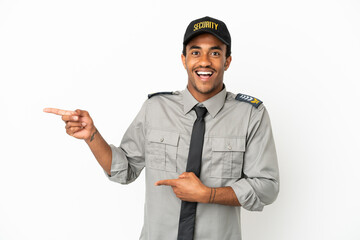 African American safeguard over isolated white background surprised and pointing side