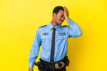 African American police man over isolated yellow background has realized something and intending...