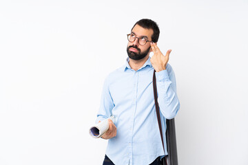 Young architect man with beard over isolated white background with problems making suicide gesture