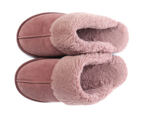 Pair of pink soft slippers isolated on white, top view