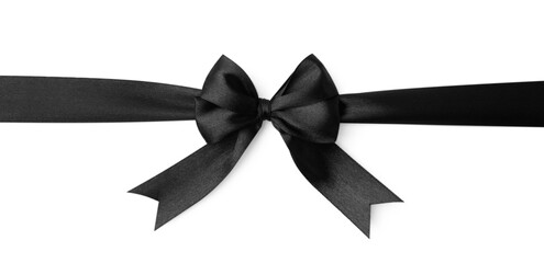 Black satin ribbon with bow isolated on white, top view