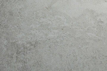 Grey concrete textured surface as background, closeup