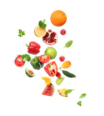 Different fresh fruits and vegetables in air on white background