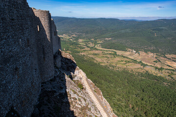 Valley and town of Duilhac-sous-Peyrepertuse in Languedoc, France - obrazy, fototapety, plakaty