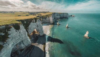 aerial view of the beautiful cliffs of etretat normandy france la manche or english channel - obrazy, fototapety, plakaty