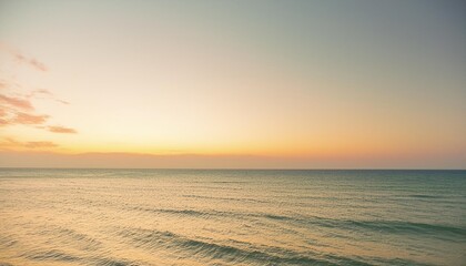 clear blue sky sunset with glowing orange teal color horizon on calm ocean seascape background picturesque generative ai - Powered by Adobe