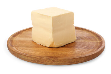 Block of tasty butter with wooden tray isolated on white