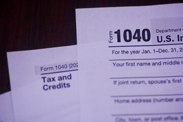 Income tax and credit for spread on a table