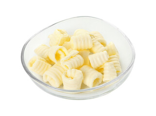 Tasty butter curls in bowl isolated on white