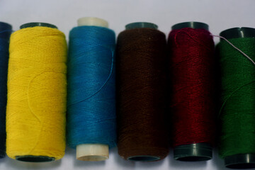 Multi colored sewing threads for fashion design sewing machine