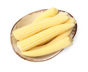 Tasty fresh yellow baby corn in bowl isolated on white, top view