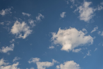 A bright blue sky full of clouds