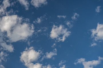 A bright blue sky full of clouds