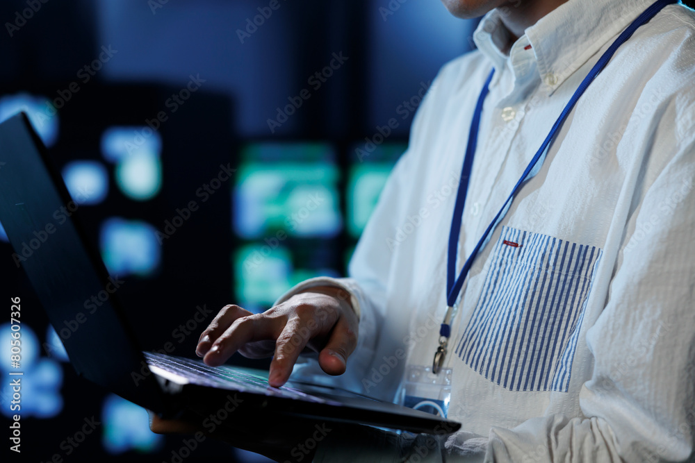 Poster admin in server room future proofing network from downtimes and unexpected system failures using lap