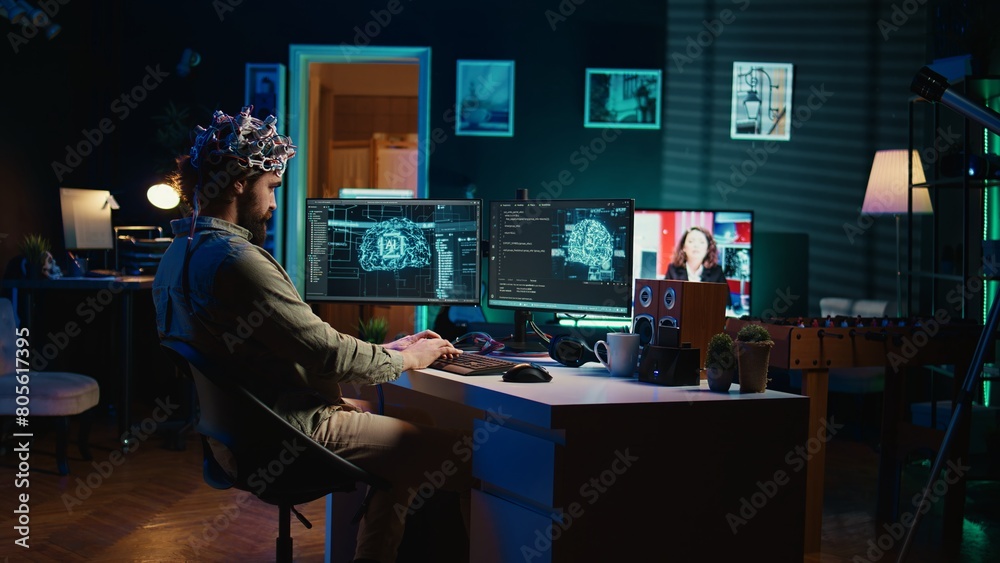 Poster engineer with eeg headset inserting cartridge into pc to use high tech software allowing for brain t
