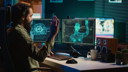 Scientist inserting disk into PC containing software evolving AI into sentient being, greeting...