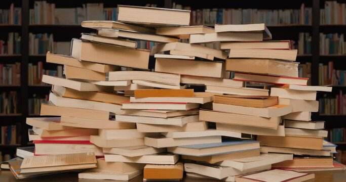 Books Pile Build Stop Motion Loop in Library Medium