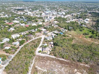 Aerial view of Bodden Town Pedro St James Savannah with iron shore community pristine blue...