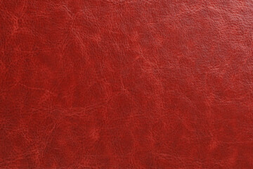 A red leather surface with shiny finish