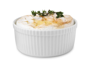 Tasty baked camembert and thyme in bowl isolated on white