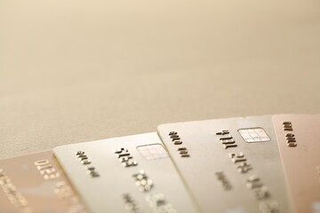 Different credit cards on table, closeup view. Space for text