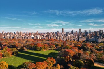 Autumn Central Park in New York with skyscrapers view from drone. Aerial of NYC Central Park...