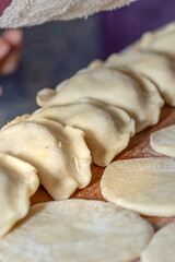 Beautiful rows with dumplings. Ukrainian national dish. Close-up.