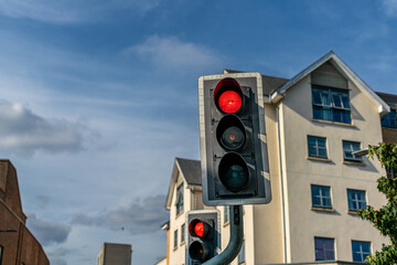 Red traffic light illuminated on a stoplight 