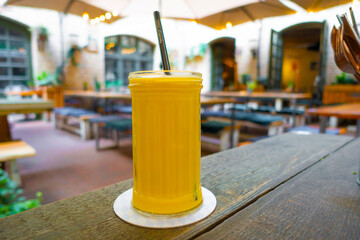 Indian ayurvedic mango lassie. Traditional healthy drink with mango.