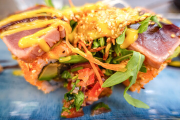 Overhead view of platter of sushi rolls