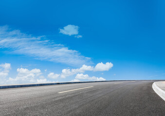 Graphic design background featuring a car on an asphalt road highway