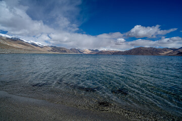 Crystal clear waters of Pangong Lake on the border of India and Tibet, the world's highest...
