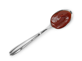 Tasty barbecue sauce in spoon isolated on white, top view