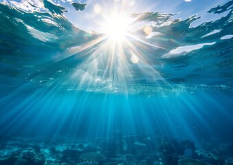 Sunbeams Radiate Through Crystal Clear Ocean Water Over Coral Reef