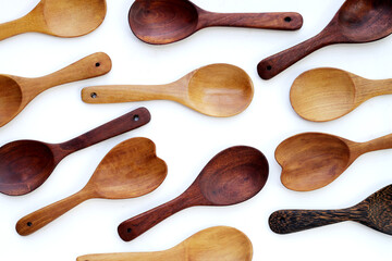 Wooden spoon on white background.