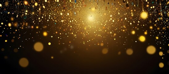 Golden blurred bokeh lights on black background. Glitter sparkle stars for celebrate. Overlay for your design