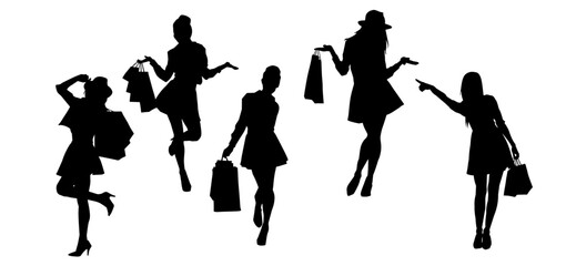 Silhouette of  slim young woman carrying shopping bags.