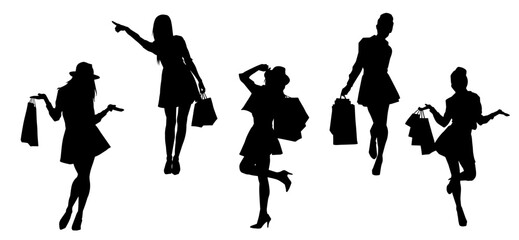Silhouette of  slim young woman carrying shopping bags.