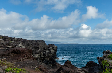 Beautiful Kapalua Coastal Trail vista on Maui, Hawaii, with Molokai Island visible at a distance