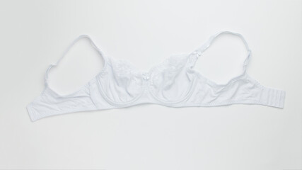 White women's bra on a white background.