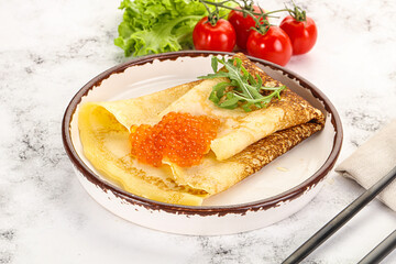 Russian pancake with red caviar